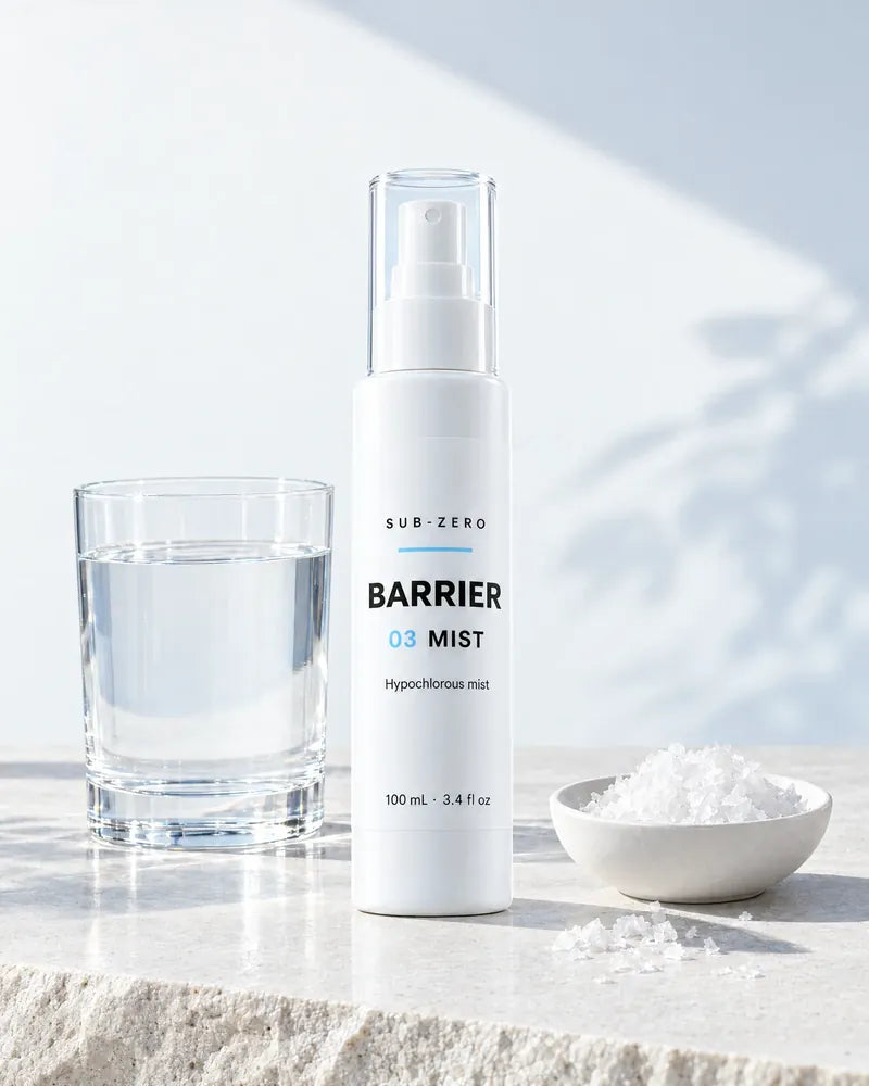 The Mist beside a glass of water and a dish of salt