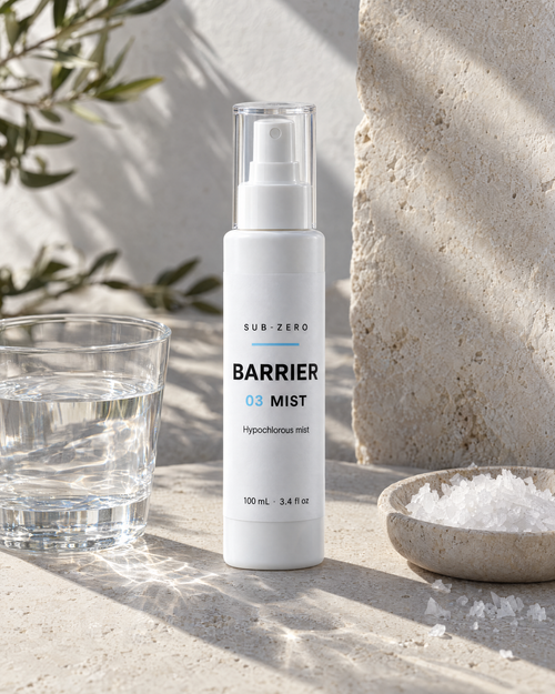 BARRIER Mist beside a glass of water and flaky sea salt, two of its three ingredients