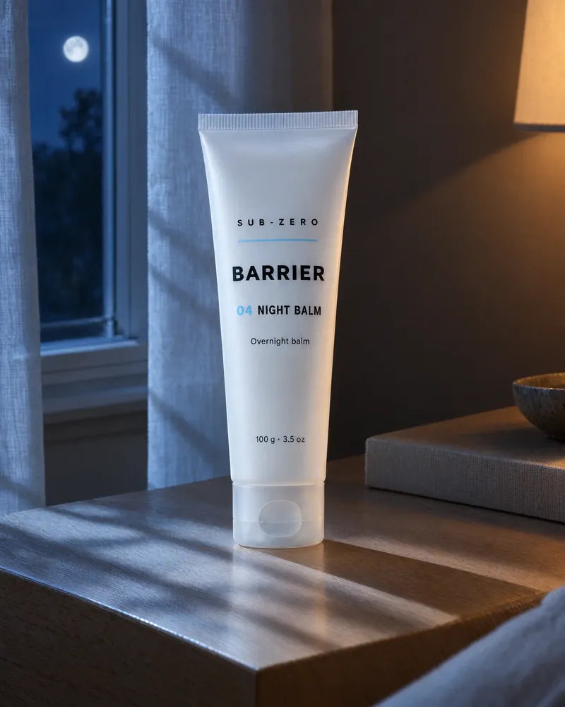 The Night Balm on a bedside table by a moonlit window